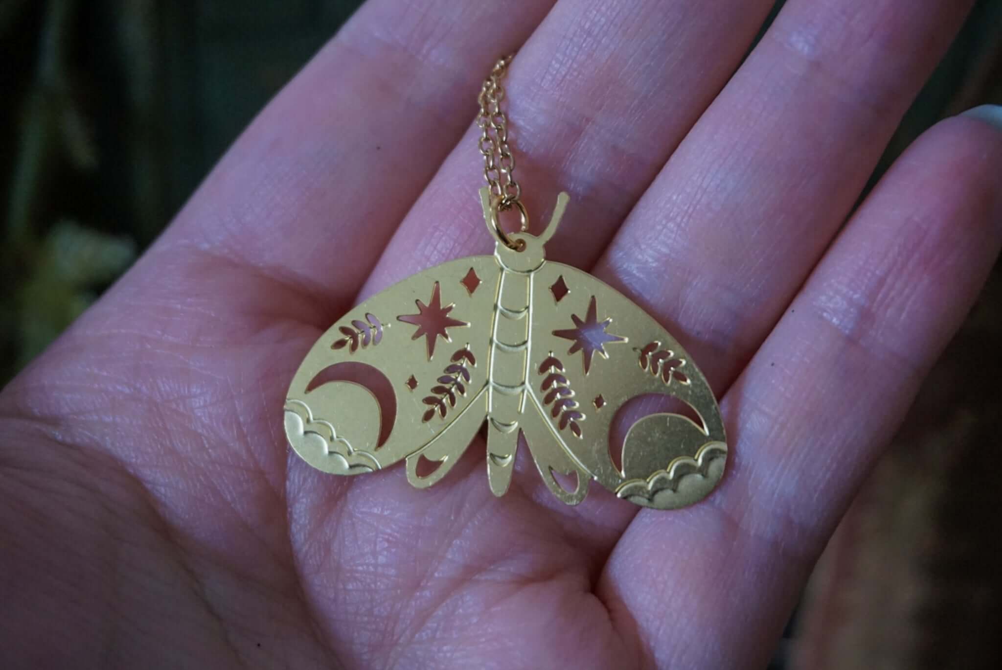 Golden Moth and Stars necklace