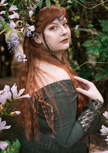 model wearing winged elf ears